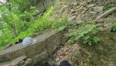 Couple plays in the woods