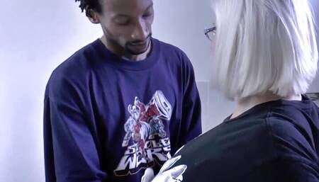 Grandma helps the painters with body painting on her nipples