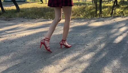 a girl in high heels sandals accidentally tripped, fell and injured her foot and toes