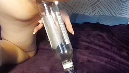 with a bottle and balls