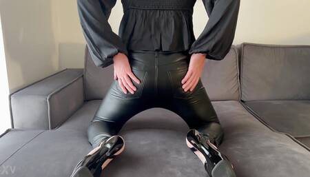 Twerking in skinny leather pants and 7-inch heels.