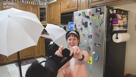 Woman dressing into shirt and tie and shorts