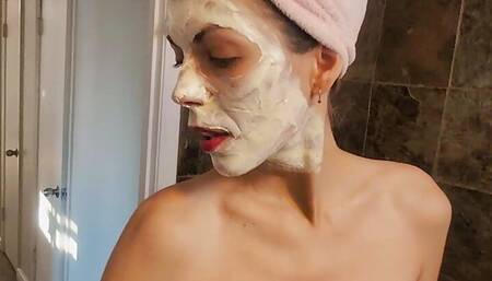 Masturbation in the bathtub with mud mask on the face