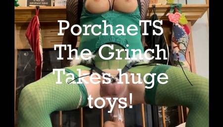 PorchaeTS the Grinch stuffs her Christmas stocking with huge toys.