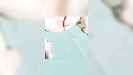 Attention young woman fountain squirting on the sunny ???? terrace outdoor fun