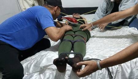 Continuation of Roxan's foot tickling by 4 people (3)