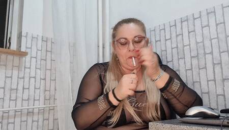 smoking and teasing you with my big tits