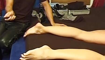 Top-class blonde German slut tied up and spanked hard in dungeon