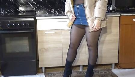 Sexy woman in street jaket and miniskirt