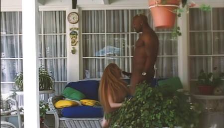 Red milf riding a great cock