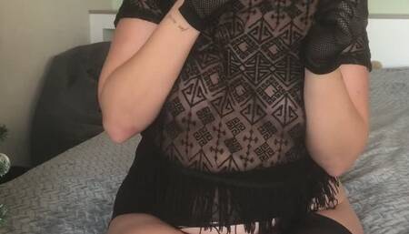 Light smoking brunette with gloves on