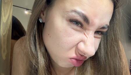 The girl tries to touch her nose with her lip, wrinkles her nose (custom video) part 2