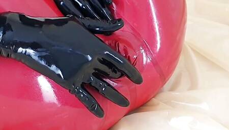 OnlyFans teaser - This is my red latex catsuit with integrated condoms!