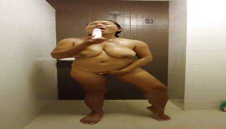 Thaiger in the Shower with her Big Dildo