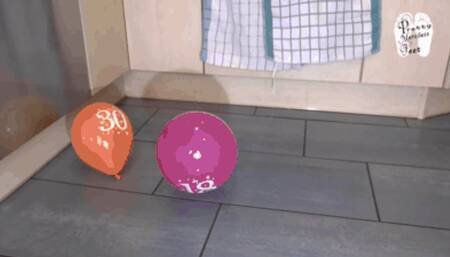 Balloons and water balls under nylon feet