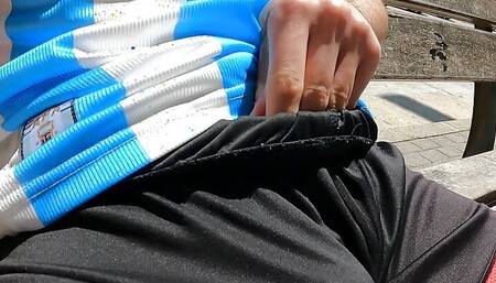 Bulging young man moans with pleasure in a public park jerking off a summer handjob