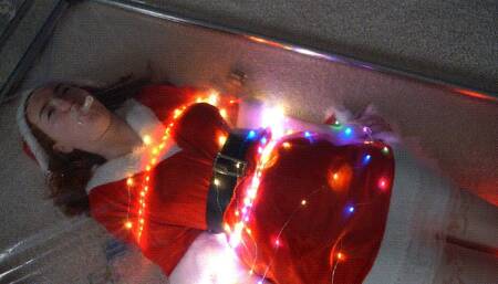 Bondage luminous garland in vacuum bed