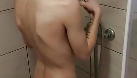 Eighteen-year-old girl masturbates in the shower with a camera