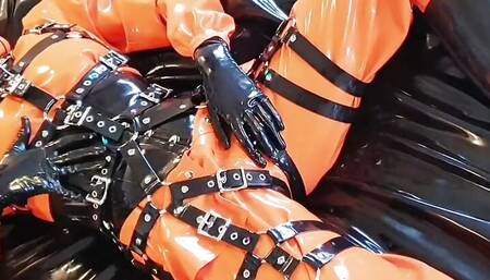 OnlyFans teaser - Heavyrubber latex lady enjoys rainwear and harness!
