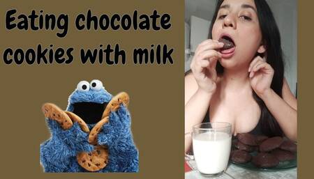 Eating chocolate cookies with milk