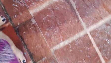 Walking barefoot in the rain wetting my feet (1)