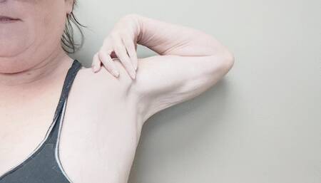 Tempest showing off biceps