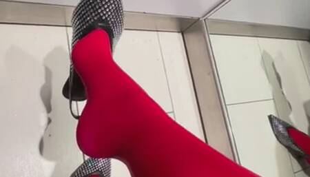 Red tights black sparkly shoe changing room dangle