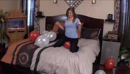 Sexy balloon popping on the bed!