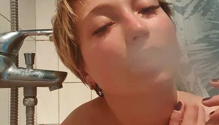 Smoking a cigarette naked in the bathtub with short pixie hairs [no nips :-P ]