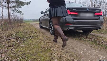 Driving BMW 5 series in Brown Boots