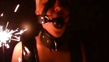 Ballgagged Blonde Loves the Heat of the Fireworks