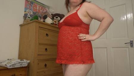 sexy wife in red lingerie striptease showing of big breasts