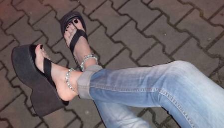 crossdresser with amazing feet on a night walk in the park