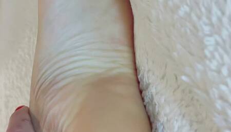 I caress my pretty feet sensually