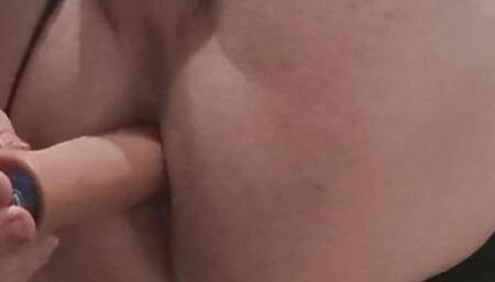 I'm alone in the hotel, I'm wearing only my thong, I've anointed my whole body with oil and I'm playing with my dildo in a very