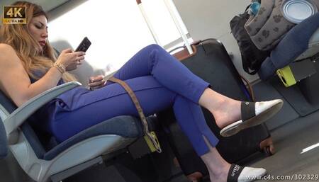 Beauty business woman show her feet and class slippers, dangling and foot fetish admiration