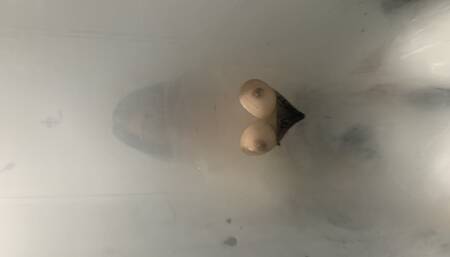 Wiping pussy cream on tits