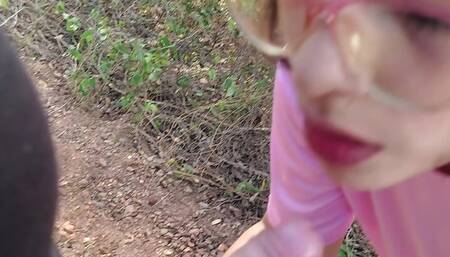 Latina teen gives a blowjob in the woods