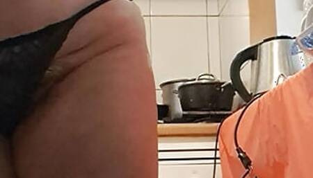 stepmother in the kitchen, cleaning up the dirty