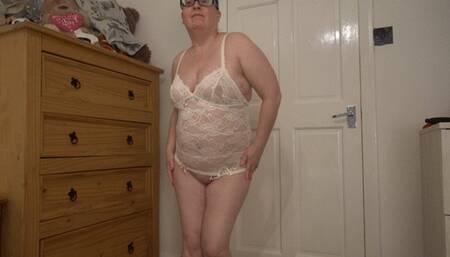 wife in white lingerie showing of her big bum and breasts