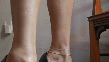 Milah Arches heel popping Queen on Black Louboutin Heels