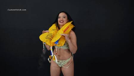 Roxy Tries on Life Vests, One with CO2 4K (3840x2160)