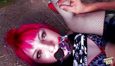 This punk goth girl with a mohawk had two big hard cocks in her mouth