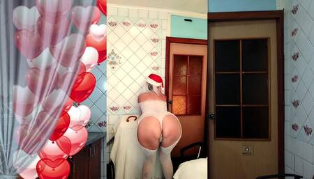 Hot housewife Lukerya in the kitchen in a New Year's cap