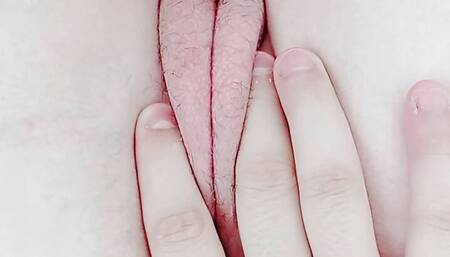 just woken up, opening her pussy still wet and tight with fluids from the night