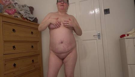 Open Panel Apron Striptease Showing of Her Big Bum and Breasts