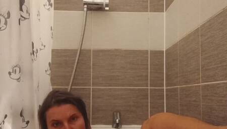 Fingering under thee shower