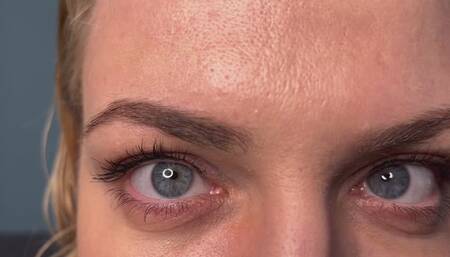 Staring into natural blue eyes