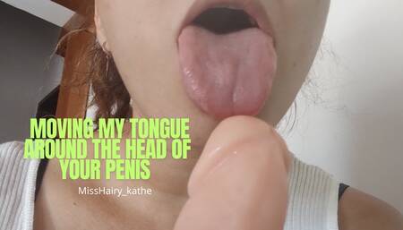 Tongue fetish moving and playing with the tip of a dildo head