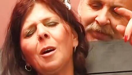 Chubby German slut sprayed with wax in BDSM scene
